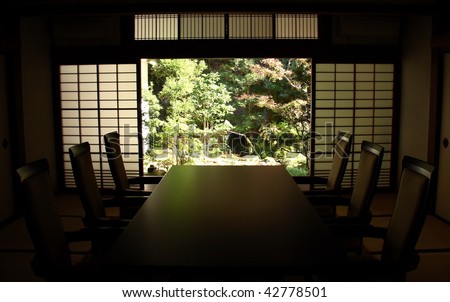 A japanese room with traditional sliding wall giving to the garden