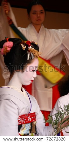 KYOTO - JAN 11:Unidentified geisha participates on a traditional New Year ceremony held on January 11 2010 in Gion district, Kyoto, Japan .The ceremony takes in an ancient Shinto Temple.