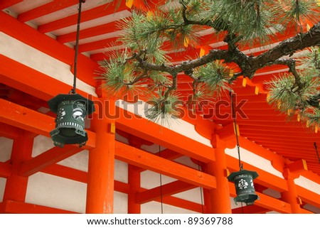 Pine tree branch and japanese lanterns in Kyoto