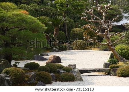 Stone bridge in a zen garden in Kyoto (Japan)