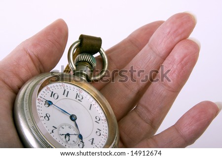 Hand Holding Watch