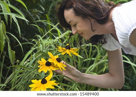 Smelling yellow flowers