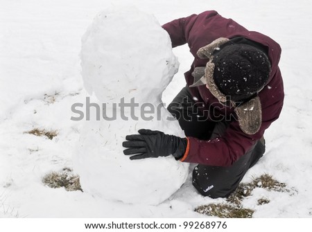 First steps to make snowman. Winter games.