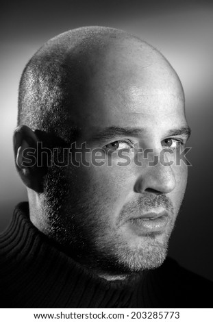 Confident handsome man close up portrait black and white