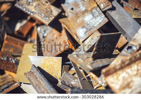Closeup pile of scrap metal junk garbage. texture background