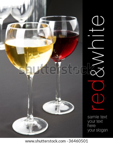 Glasses of red and white wine on grey background. Space for text isolated on black sidebar on right