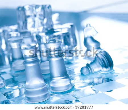 Chess board and pieces in blue ambient light