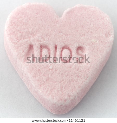 Candy conversation heart with \'ADIOS\' text