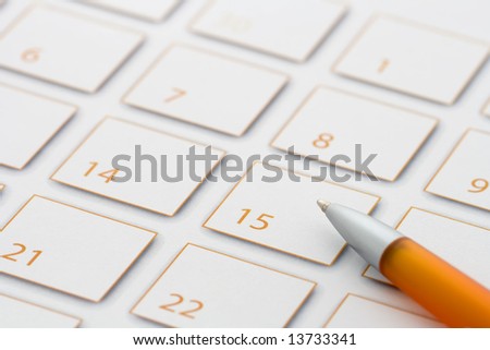 Orange pen on Orange calendar