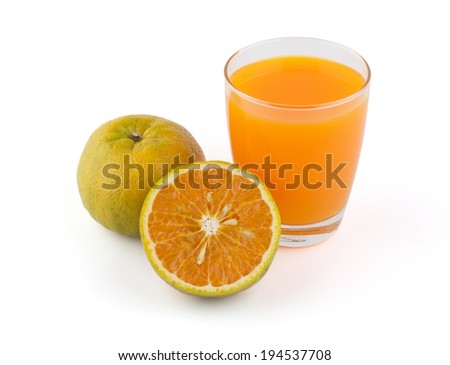 Glass of orange juice and sliced orange isolated on white background