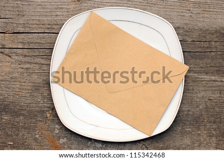 postal envelope on wood texture. With copy space