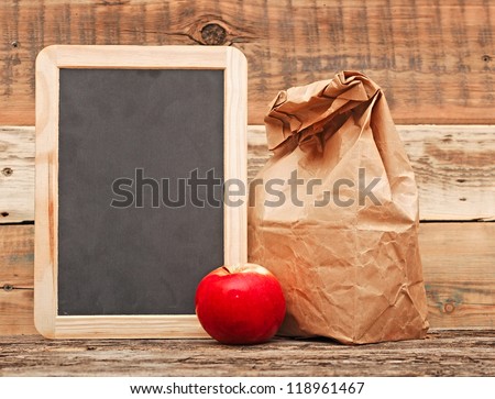 school lunch over blank blackboard