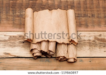 blank old sheet paper on pile scrolls