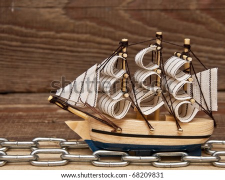 model ship on wood background