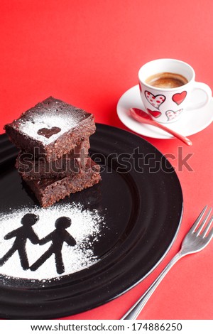 brownies and coffee on red background