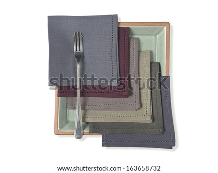 color linen napkins with a silver fork