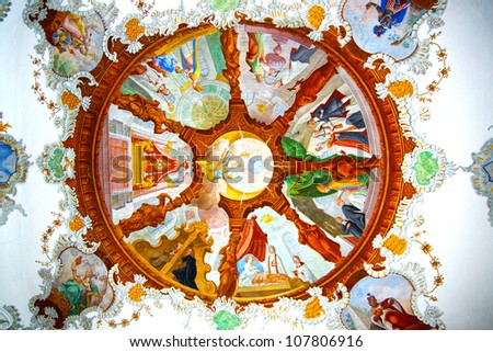 FUSSEN, GERMANY - JUNE 11: Luxurious ceiling fresco of the Church of the Holy Spirit. June 11, 2012 Fussen in southwest Bavaria, Germany. Interior of the hospital Church of the Holy Spirit in Fussen.
