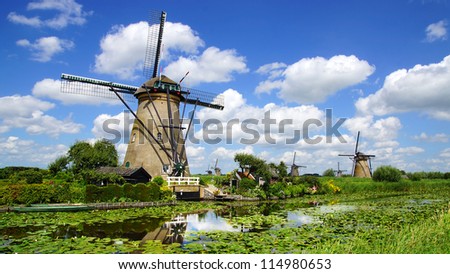 KINDERDIJK, HOLLAND - AUGUST 03: The windmills of Kinderdijk have been a UNESCO World Heritage Site. In most of the mills in Kinderdijk still live people.; August 03, 2012 in Kinderdijk, Holland.