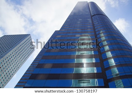Hong Kong, China - February 16: Ifc Is Reflected In The Exchange Square Tower. This Complex Of Office Towers Is Home To The Hong Kong Stock Exchange On February 16, 2013 In Hong Kong, China.