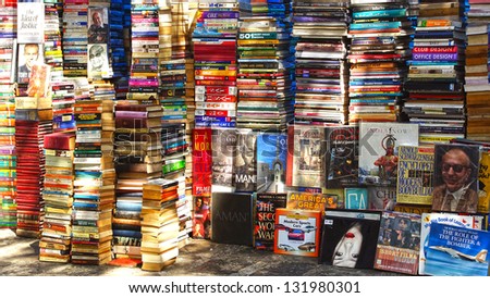 MUMBAI,INDIA-FEBRUARY 13:Piles of books on the sidewalk in the street of booksellers.Here can buy books,originals and counterfeits, at 20-60% of the listed publisher\'s price;Febuary 13,2012 in Mumbai