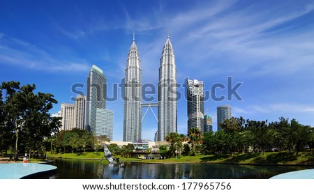 KUALA LUMPUR MALAYSIA JANUARY 31 Petronas Towers on January 31 2014 in Kuala Lumpur Malaysia.Petronas Towers also known as Menara Petronas is the tallest buildings in the world from 1998 to 2004 KUALA LUMPUR MALAYSIA JANUARY 31 Petronas Towers on January 31 2014 in Kuala Lumpur Malaysia.Petronas Towers also known as Menara Petronas is the tallest buildings in the world from 1998 to 2004