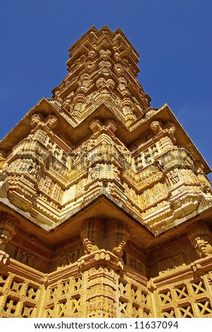 Tower of Fame on a background of the blue sky.  The 22m-high kirti stambha probably 12th century. chittorgarh, India