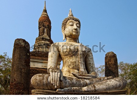 Thailand, Sukhothai Historical park. Statue of a  sitting deity in historical park Sukhothai.