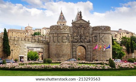 TOLEDO, SPAIN - JUNE 09, 2014: Alfonso VI Gate. Old Bisagra Gate-Alfonso VI Gate, is one of Toledo\'s best-known monuments. Built in the 10th century under Muslim domination.
