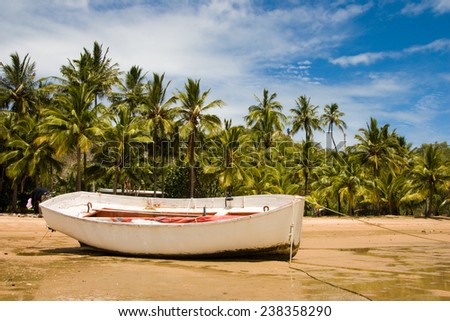 Boat on the beach of Magnetic Island - Queensland, Australia