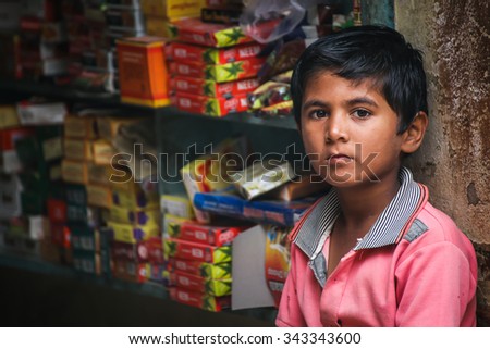Jaisalmer,India - November 10,2015 : Boy in grocery store Jaisalmer,India