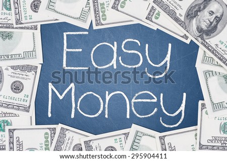 EASY MONEY text written on a blue chalkboard with frame made of 100 US dollars.