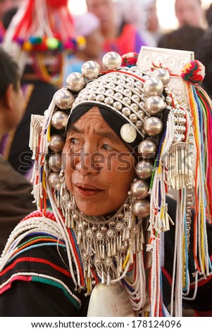 CHIANG MAI, THAILAND - JAN 27 : Unidentified  hill tribe was waitting for health service  with traditional clothes and silver jewelery at  Ban muang-ngam on january 27, 2014 in Chiang Mai, Thailand.
