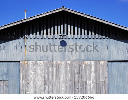 Blue Barn in south-central Kentucky farm country rural sky weathered texture art homestead wood decay door