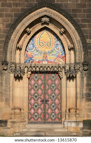 Side entrance door of gothic church of St. Peter and Paul on Vysehrad in Prague. Established in 1st half of 11 century, last rebuild was finished in 1903.