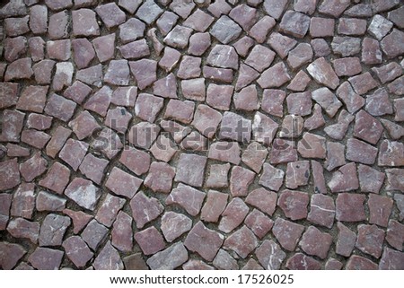 Cube stone structure of Prague pavement. Background texture.