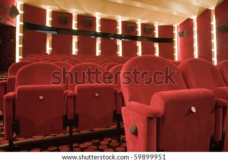 First row in cinema auditorium with seat #1.