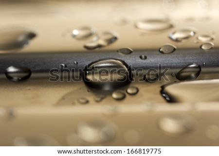 Effect with water drops on green textile