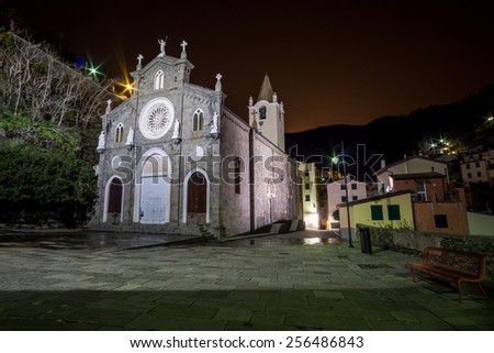 Church of St Giovanni Battista taken at night. A small church looking over the small town of Riomaggiore in Italy.