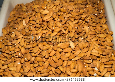 Health booster high protein high energy food almond seeds on an open air food market stand.