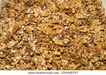Health booster high protein high energy food crispy walnut seeds on an open air food market stand.