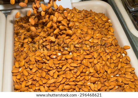 Health booster high protein high energy food almond seeds on an open air food market stand.