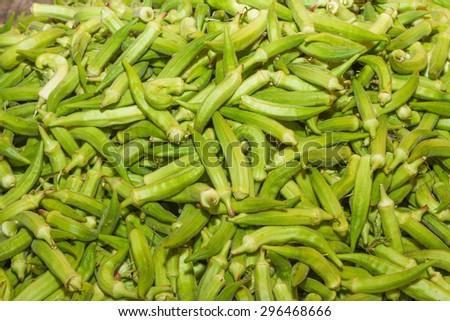 Healthy super food vegetable okra on an open air fruit market stand