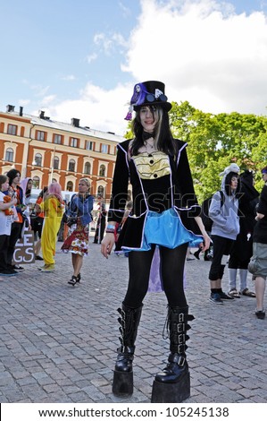 UPPSALA, SWEDEN - JUNE 15: Unidentified young people in Swedish character cosplay pose in Anime and Manga event. The official name is Uppsalakaj and org are uppcon in Uppsala Sweden June 15, 2012