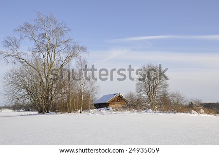 A old barn in wintry landscape