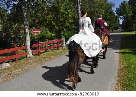 Wedding pair on horse