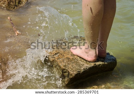 Woman Legs in Water Splash on Sea Shore