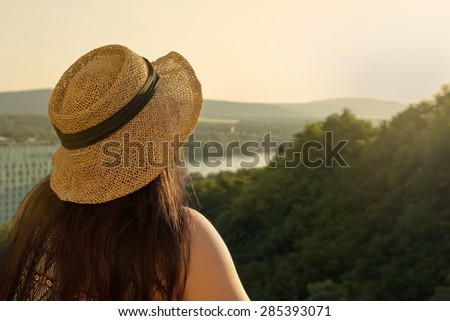 Woman from Behind Looking Away from Balcony