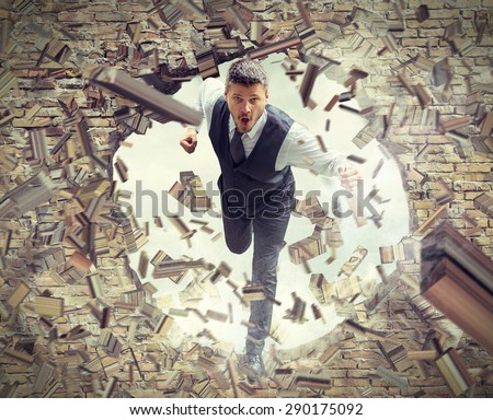 Businessman Running and Breaking Wall