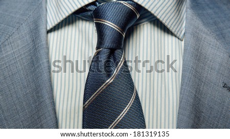 Detail of a man\'s business suit. tie and a shirt