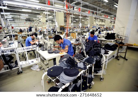 Turkey textile industry,July 24, 2014. Textile is very important sector for turkish economy. At the same time this sector is generating  employment. The workers are seen on the picture in a factory
